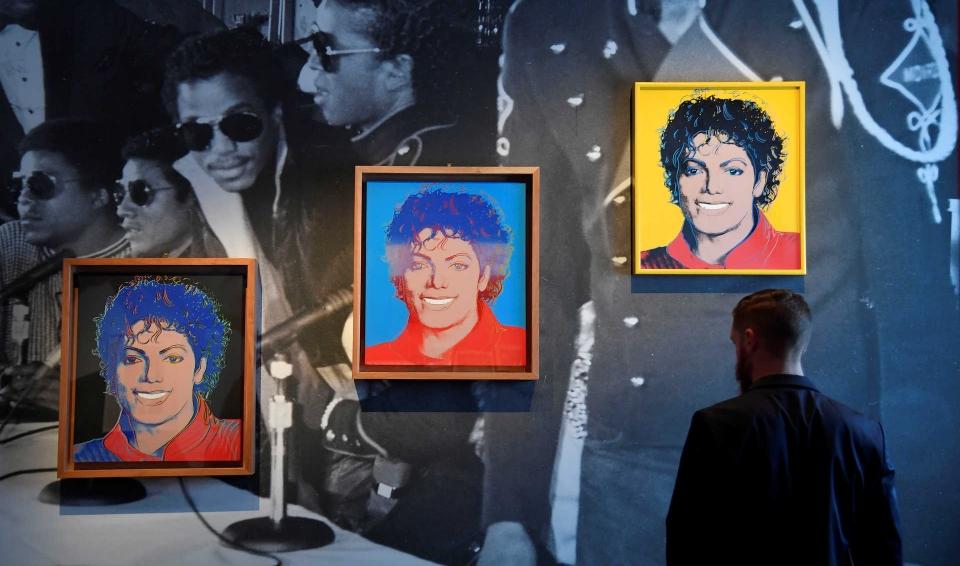 A visitor views ‘Michael Jackson’ by Andy Warhol which forms part of the exhibition ‘Michael Jackson: On The Wall’ at the National Portrait Gallery in London, Britain