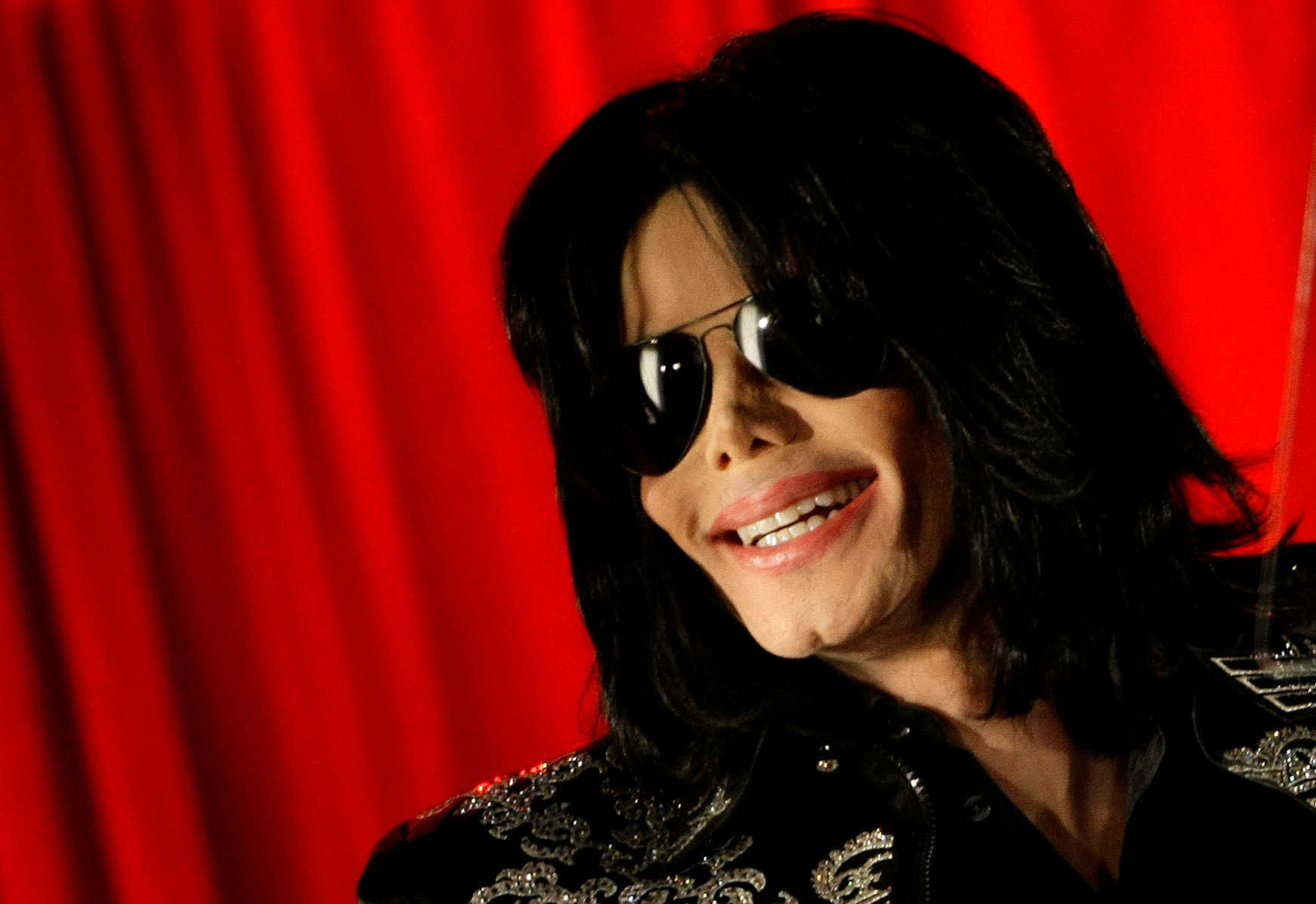 FILE PHOTO: U.S. pop star Michael Jackson gestures during a news conference at the O2 Arena in London